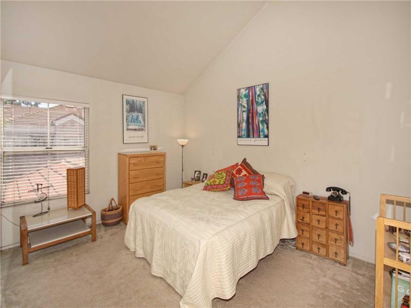 Large master bedroom with volume ceilings