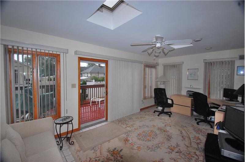 FAMILY ROOM ,2 SKYLIGHTS,FRENCH DOORS TO WOOD DECK