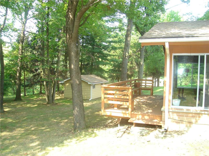 Enclosed porch to enjoy the changing seasons.
