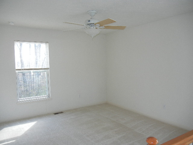 Large loft is perfect for an extra playroom, workout area, or office
