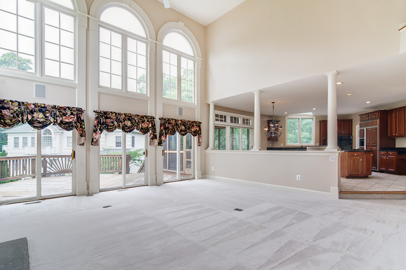Alternate view family woom w/wall of windows