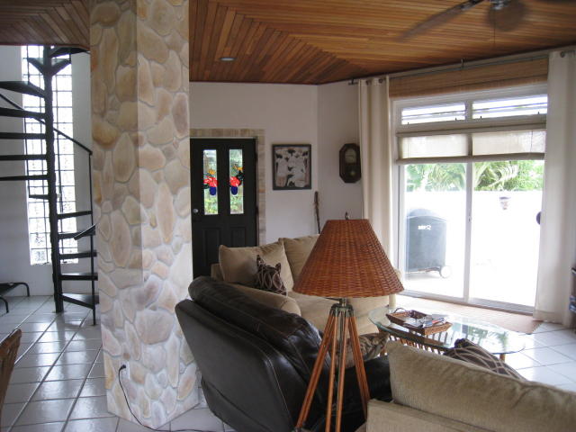 Breezy  Living Room Opens to Patio