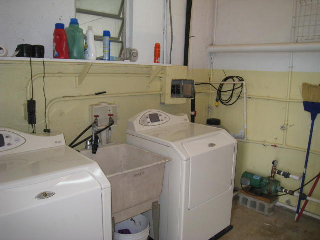 Laundry Room with Maytag Neptune Appliances