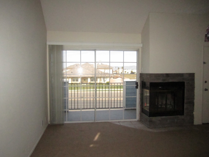 Fireplace/living room and slider to deck