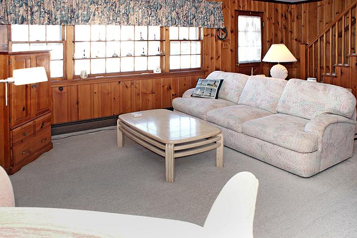 Living Room overlooks a large slate porch
