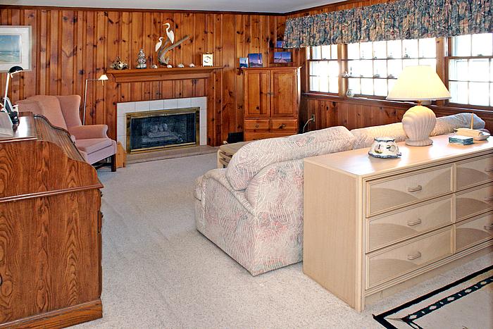 Living Room features a central gas fireplace