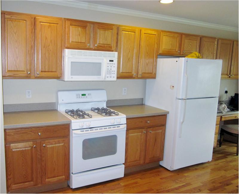 Kitchen with oak cabinets