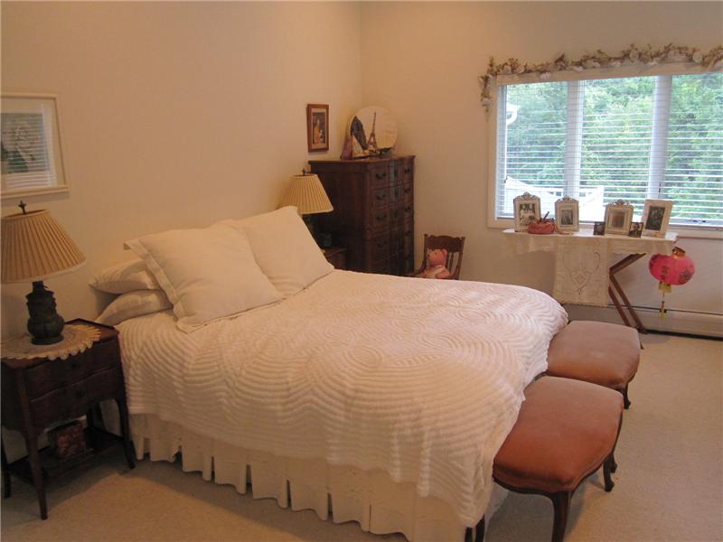 2nd Bedroom with sitting area and cathedral ceiling