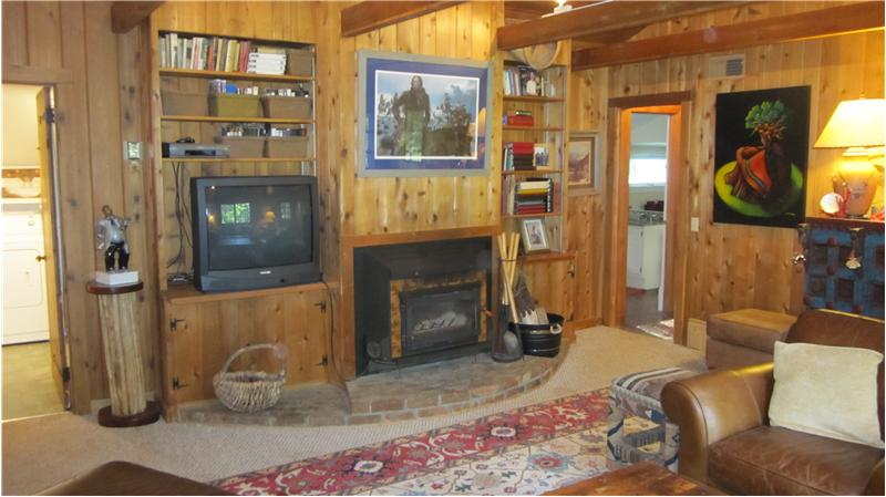 Fireplace and built-in shelves in family room