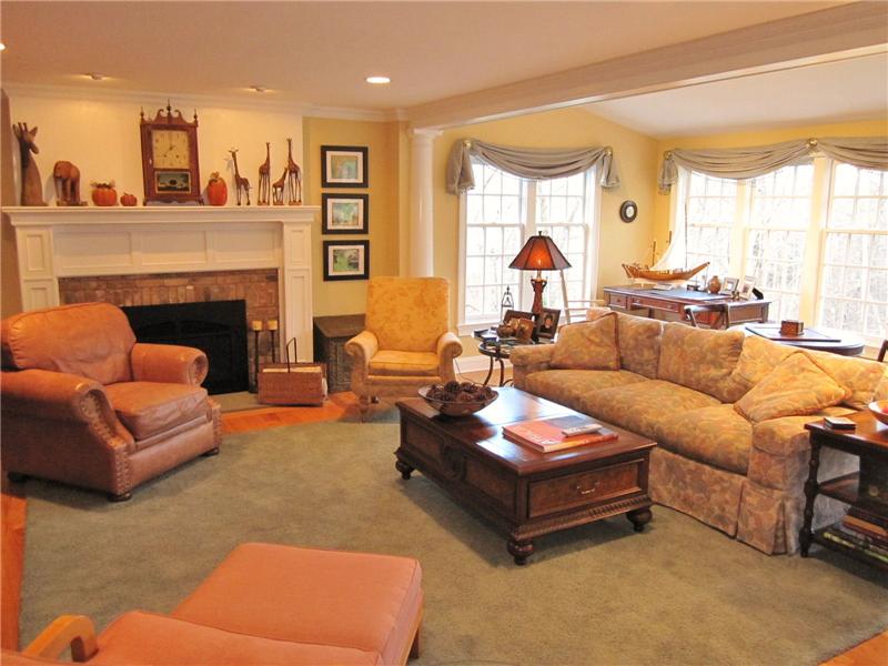 Spacious Family Room with wood burning fireplace
