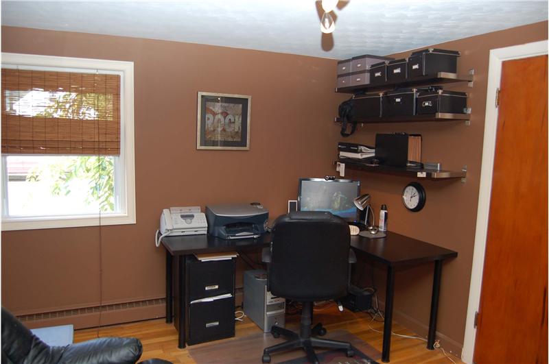 Two bedrooms with hardwood floors